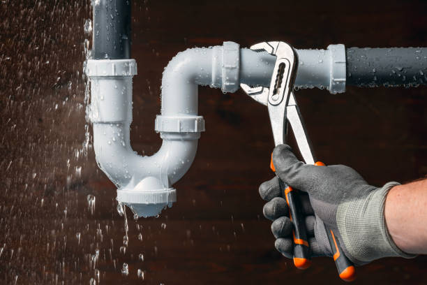 Professional Emergency Plumber technician working in Watertown, MA